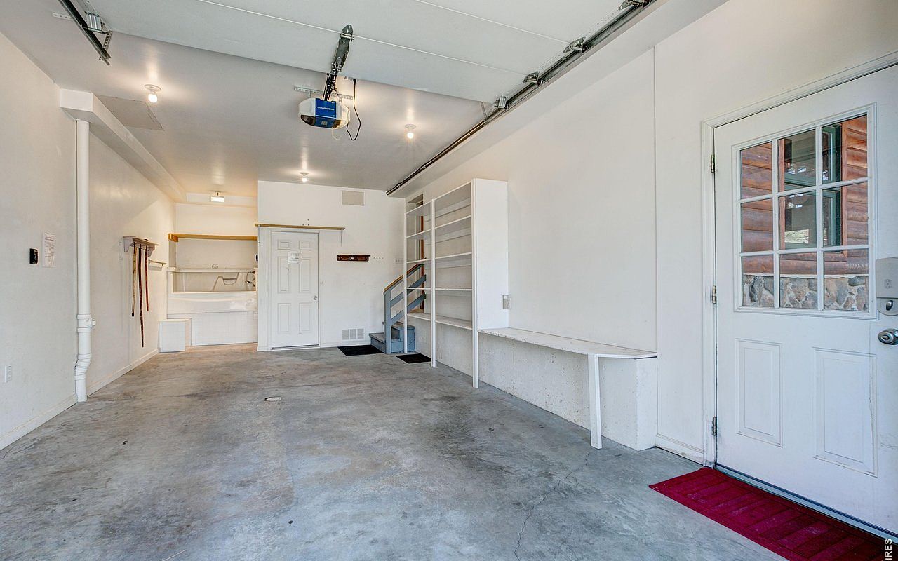 The mudroom garage where the dog wash lives today — being upgraded